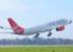 virgin atlantic plunges to record annual loss